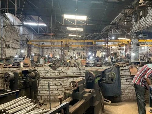 Aarko machine shop with lathes and overhead crane